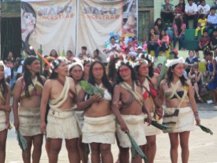 Waoranis from a distant part of the rain forest perform a traditional dance at a festival the next day