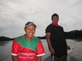 Two of our guides, Oswaldo and Alex (driving the motorized canoe)